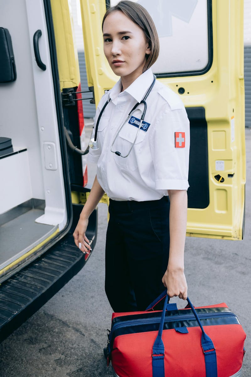 Paramedic with a Bag of Medical Equipment